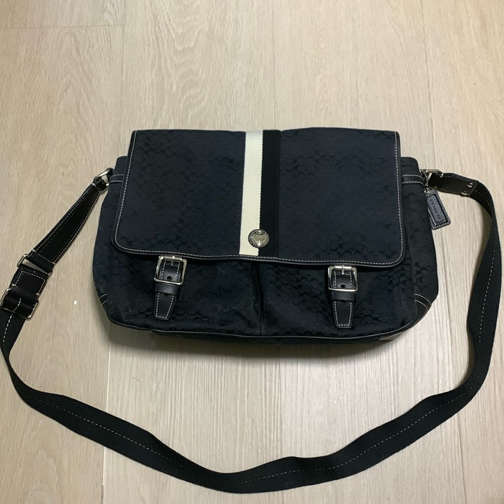 Never used Coach Voyager Signature Canvas Messenger black bag.
